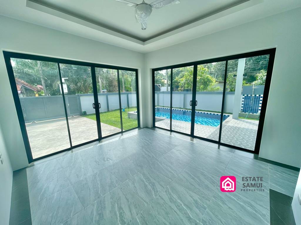 downstairs bedroom opening to pool and garden