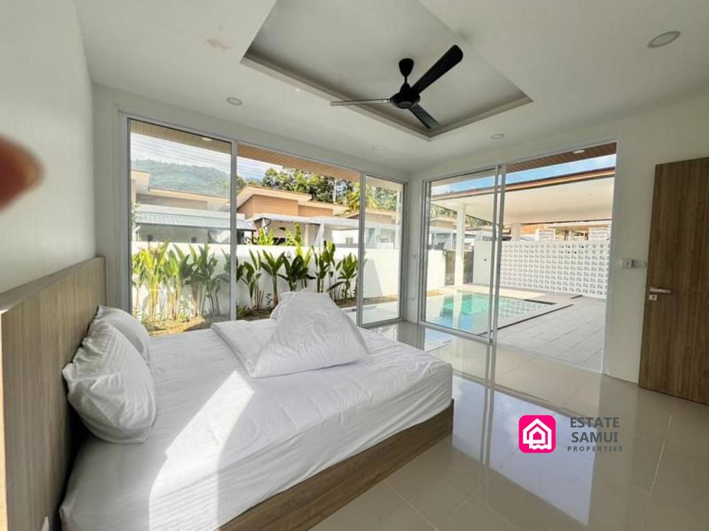 bedroom with pool view