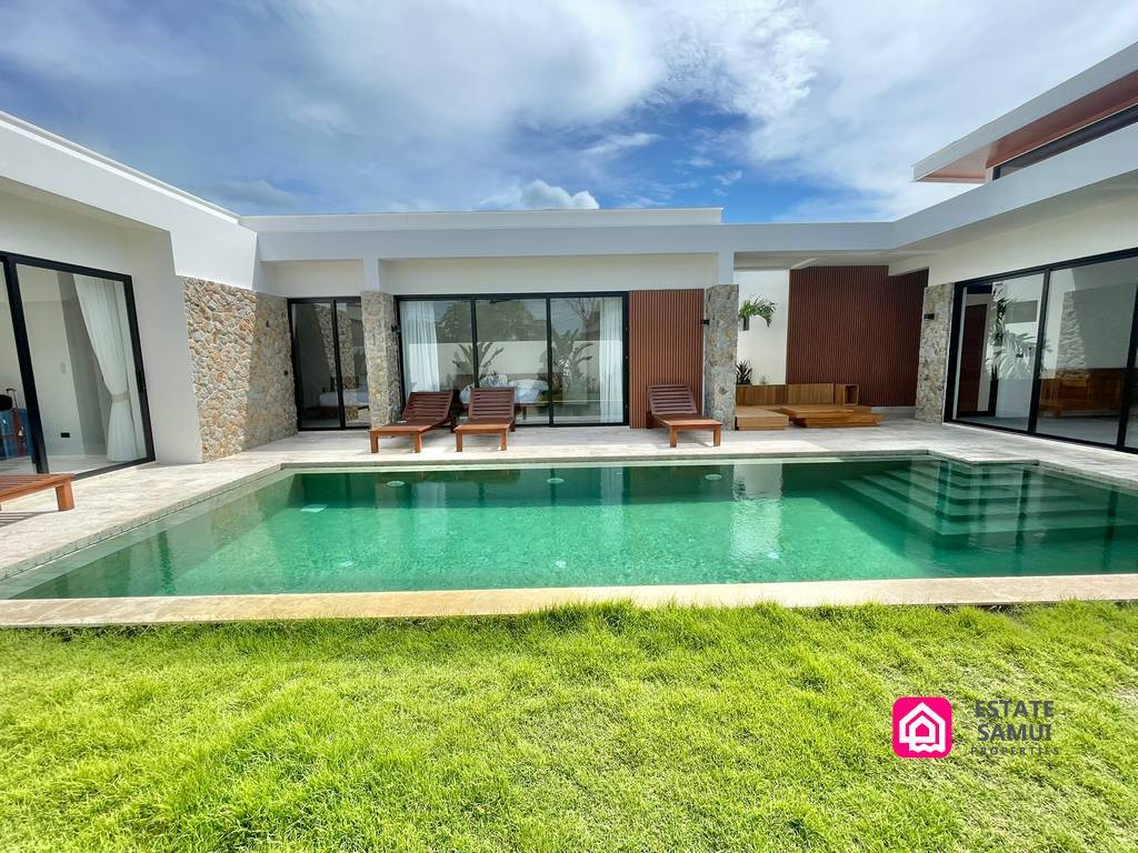 Swimming pool and covered seating within the villa courtyard