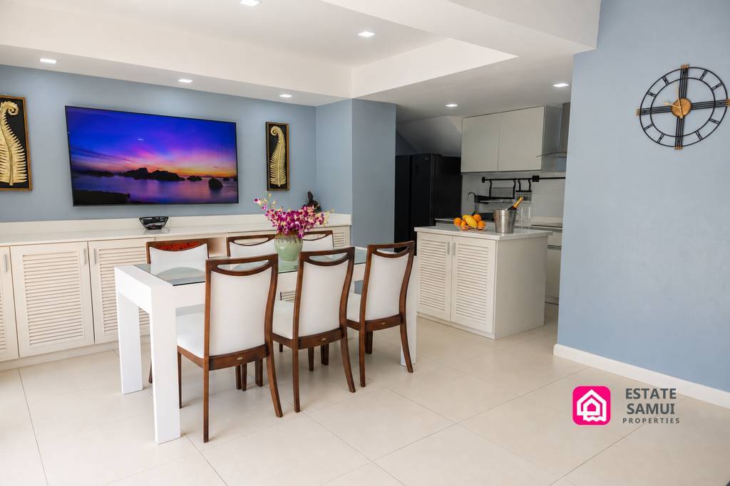 Dining area and fitted kitchen inside the beachside pool villa