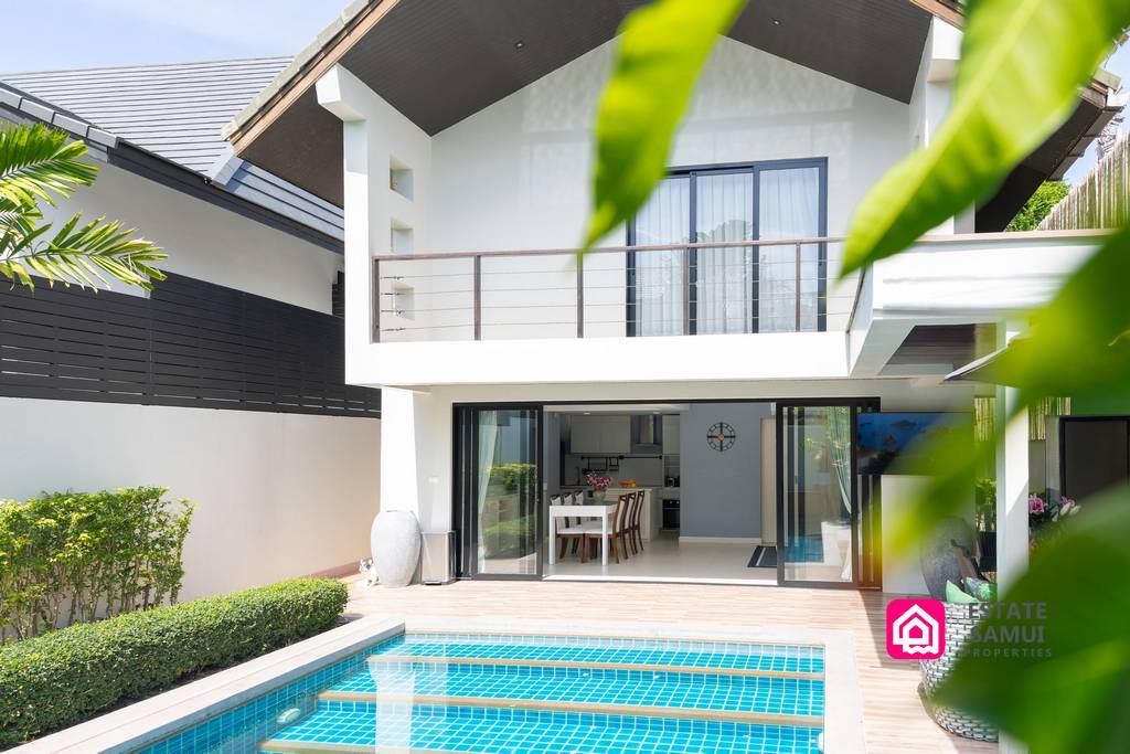 Two-storey villa exterior overlooking private swimming pool