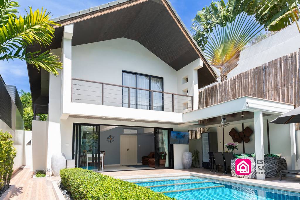 Beachside pool villa with two-storey exterior and covered terrace