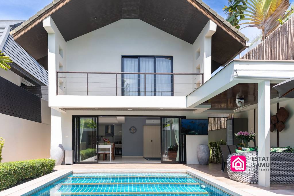 Front view of villa with balcony and private swimming pool
