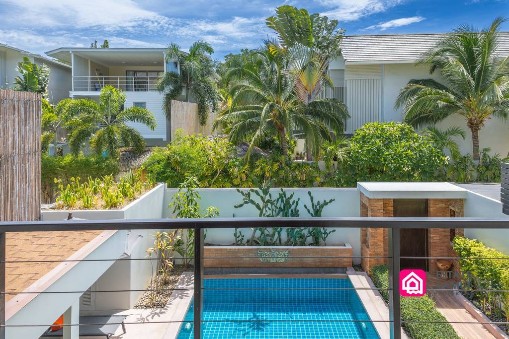 Upper balcony overlooking private pool and tropical surroundings