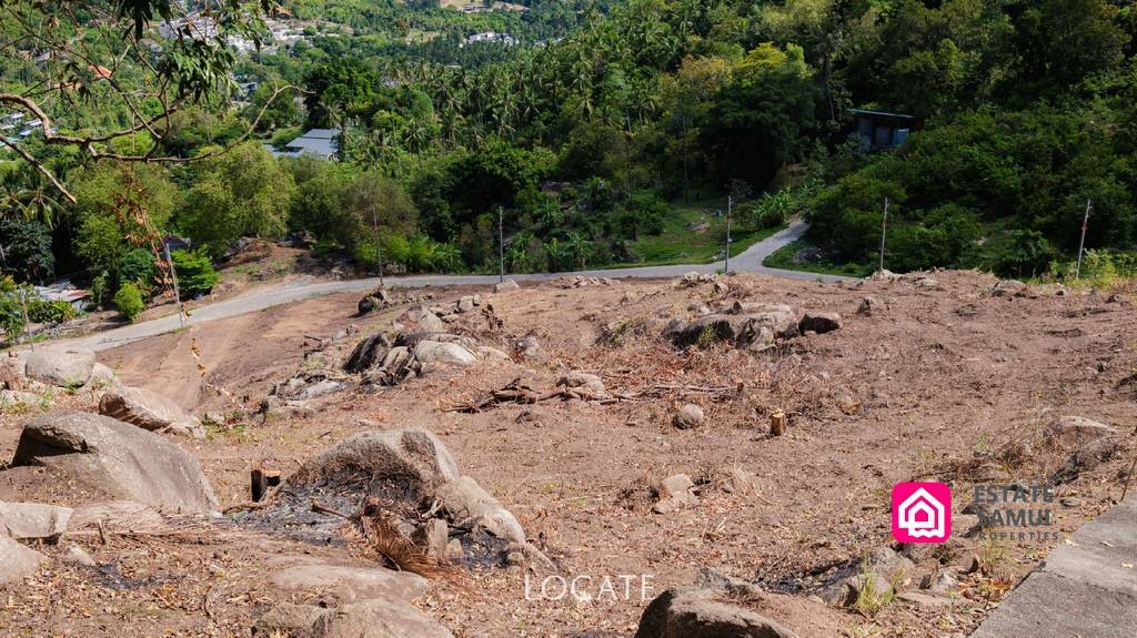 Elevated hillside plot with tropical valley and neighbouring villas in Chaweng Noi
