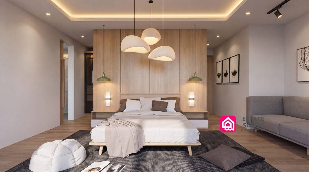 Spacious bedroom with wood-panelled headboard, pendant lights and seating area