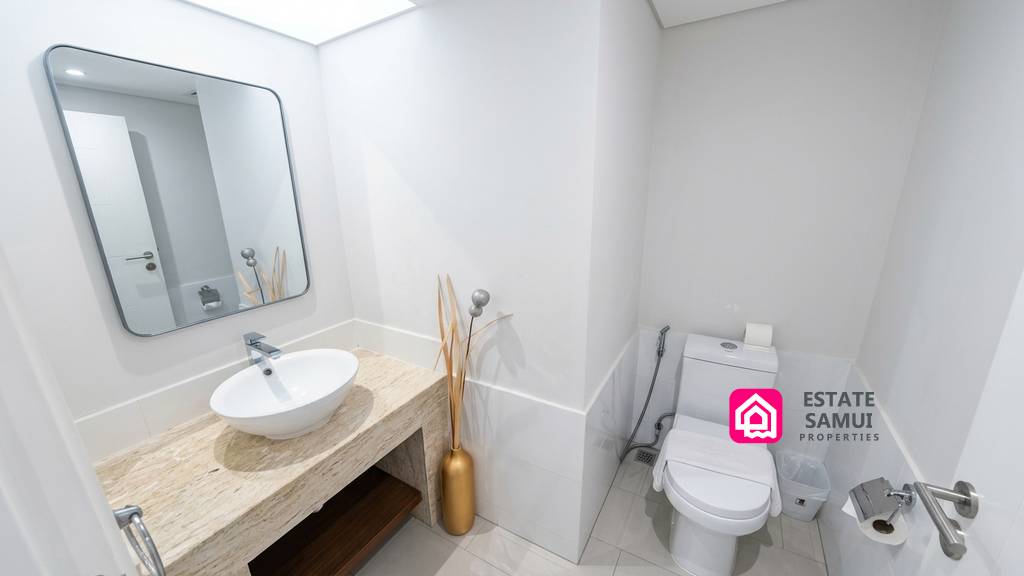 Ground-floor guest WC with stone vanity and vessel basin