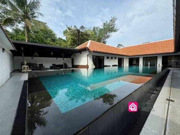This peaceful pool villa has a large private swimming pool with covered outdoor seating area