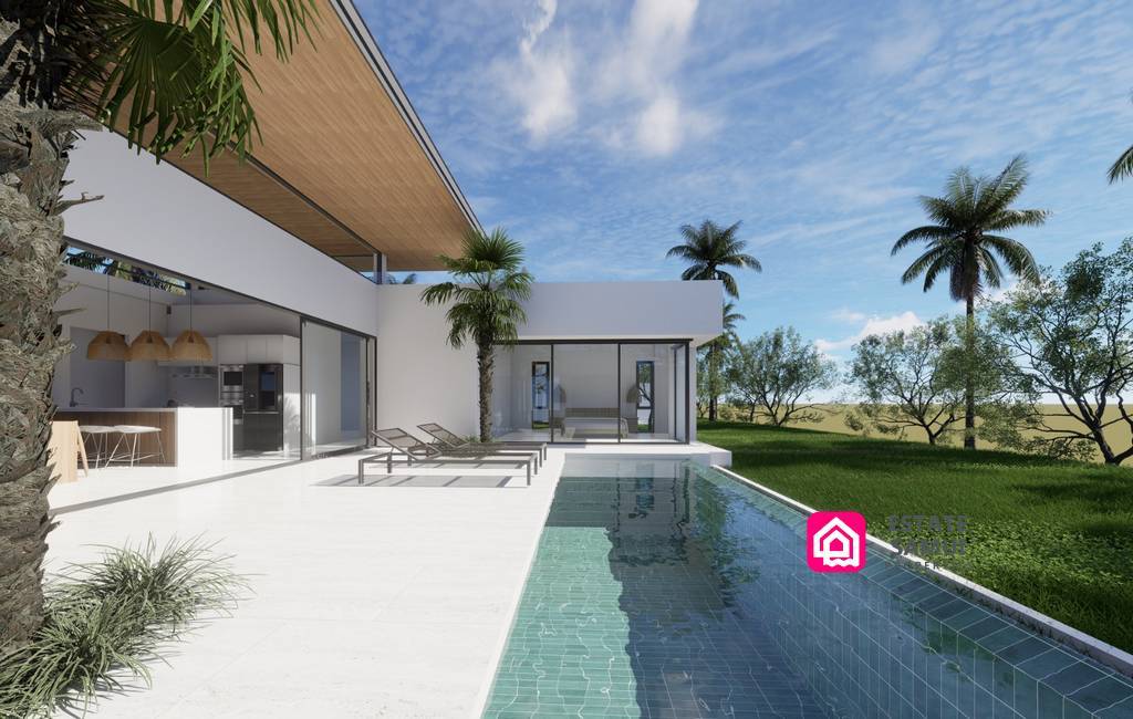 Long saltwater swimming pool beside the covered terrace and garden