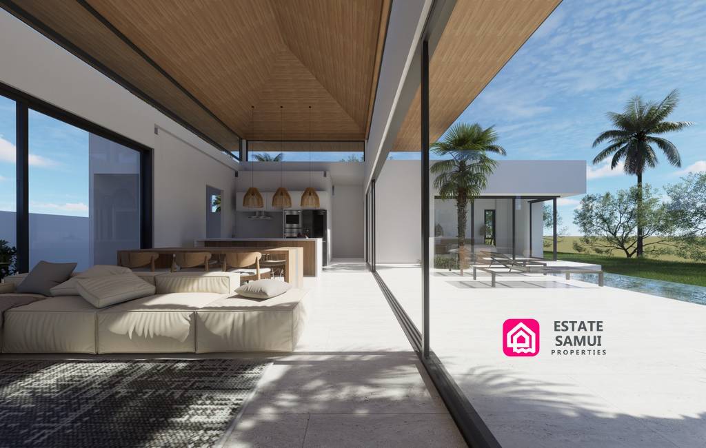 Open-plan lounge and kitchen connected to the sunlit pool terrace