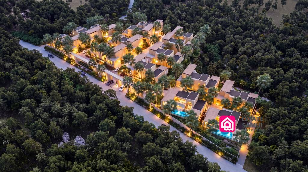 Aerial view of ULU Villas surrounded by tropical greenery