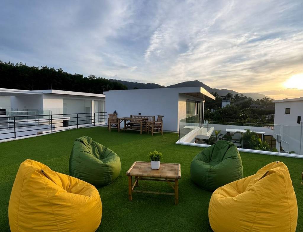 Roof terrace with outdoor seating and hillside views