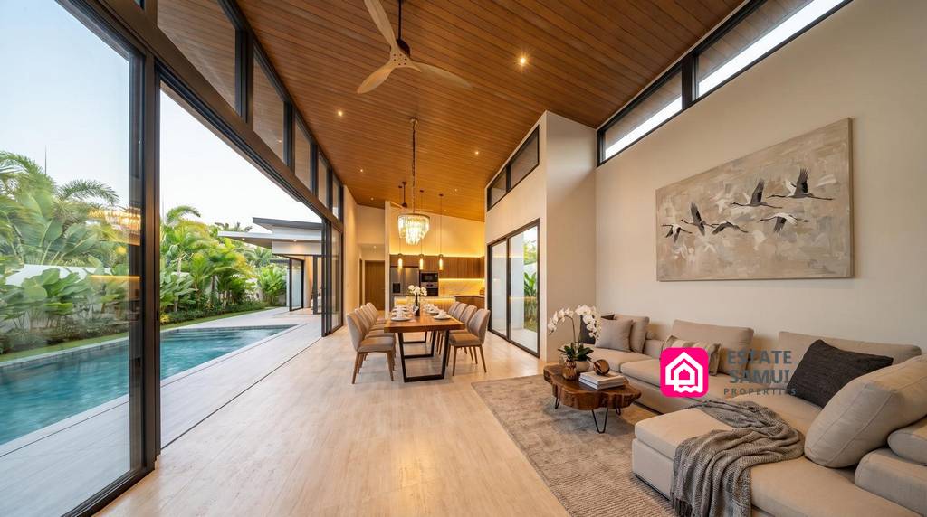 Open-plan living and dining room beside the private swimming pool