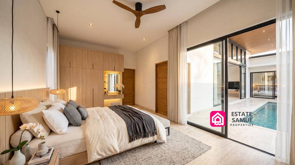 Modern bedroom with sliding doors facing the pool courtyard