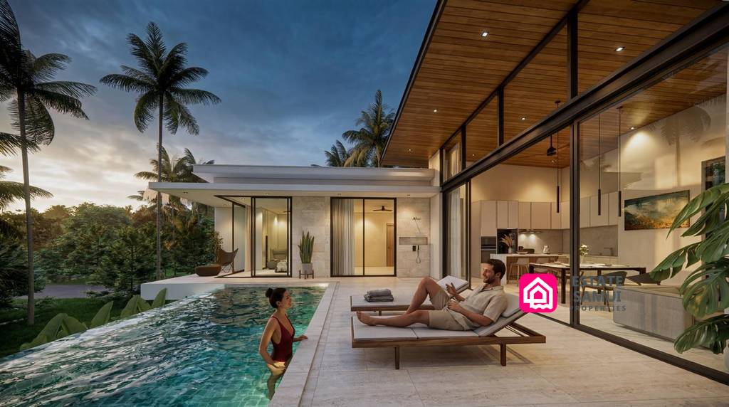 Pool terrace beside the villa’s floor-to-ceiling glass doors