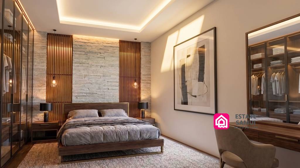 Bedroom with double bed, bedside tables and fitted wardrobes
