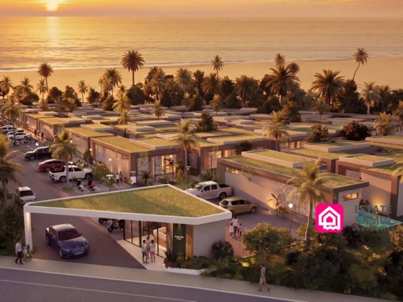 1. Elevated view of resort buildings, pools and surrounding palms