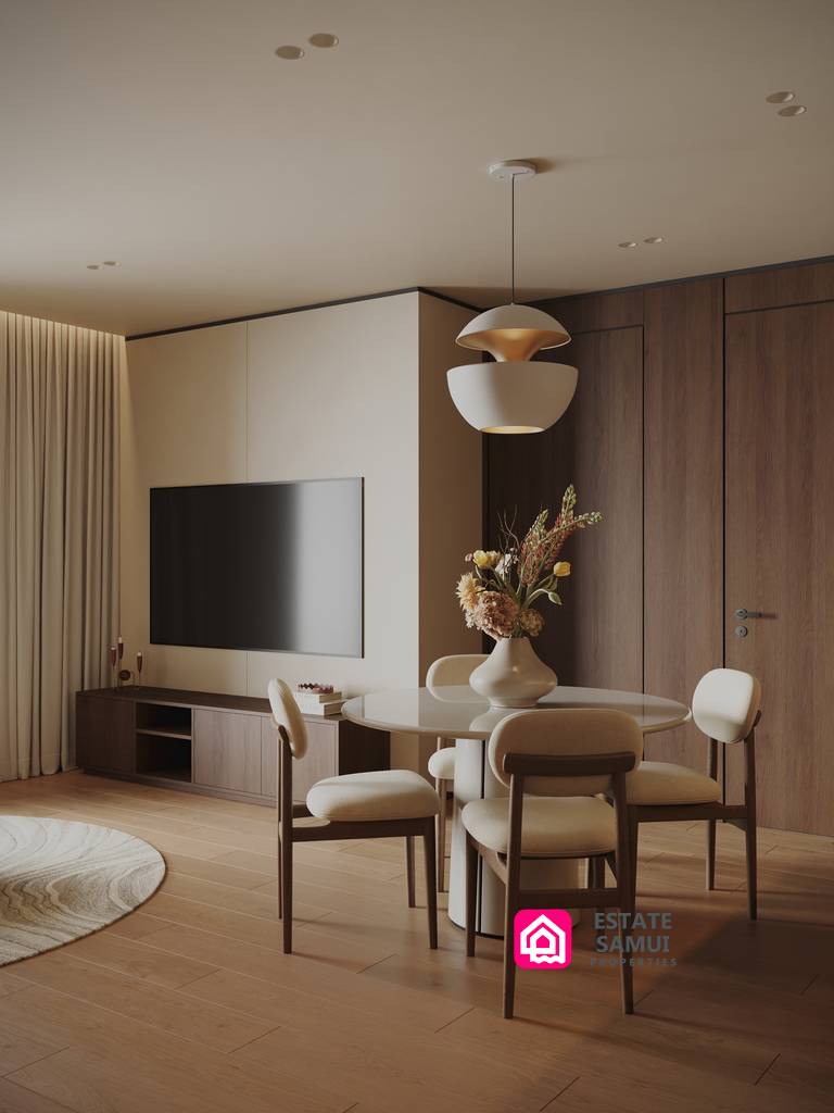 1. Open-plan dining and living area with television and wood cabinetry