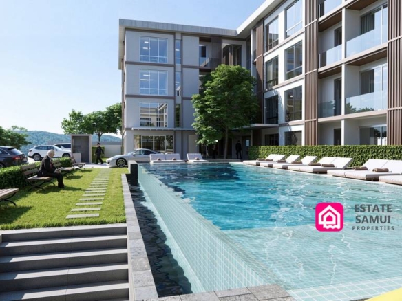 Shared swimming pool between condo buildings with landscaped edges