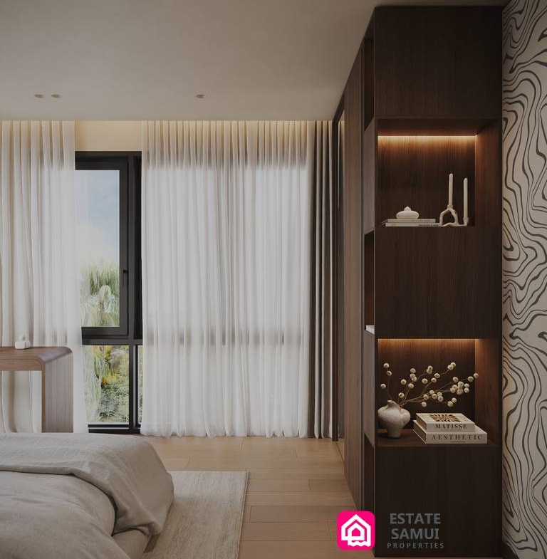 Bedroom with built-in shelving and full-height curtains