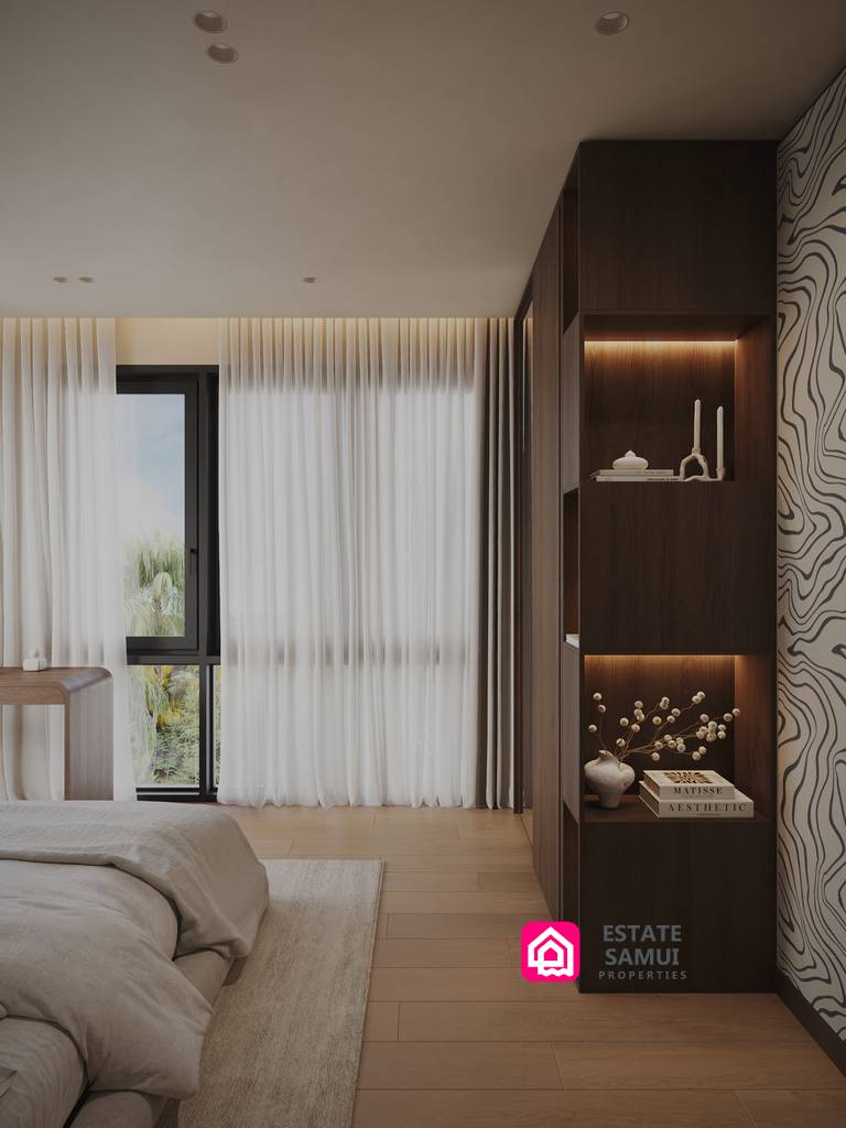 Bedroom with built-in shelving and full-height curtains