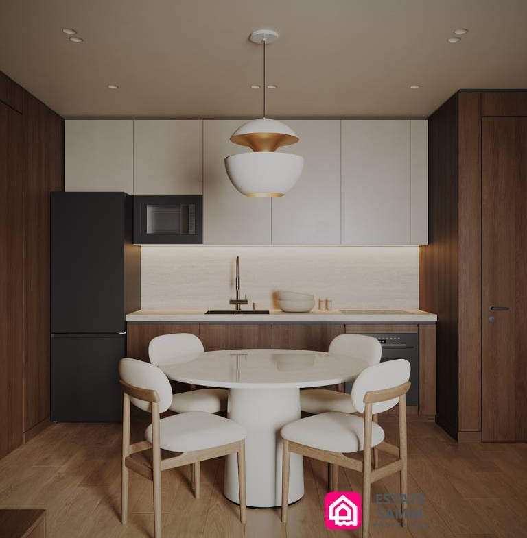 Dining table and kitchen area with wood cabinetry