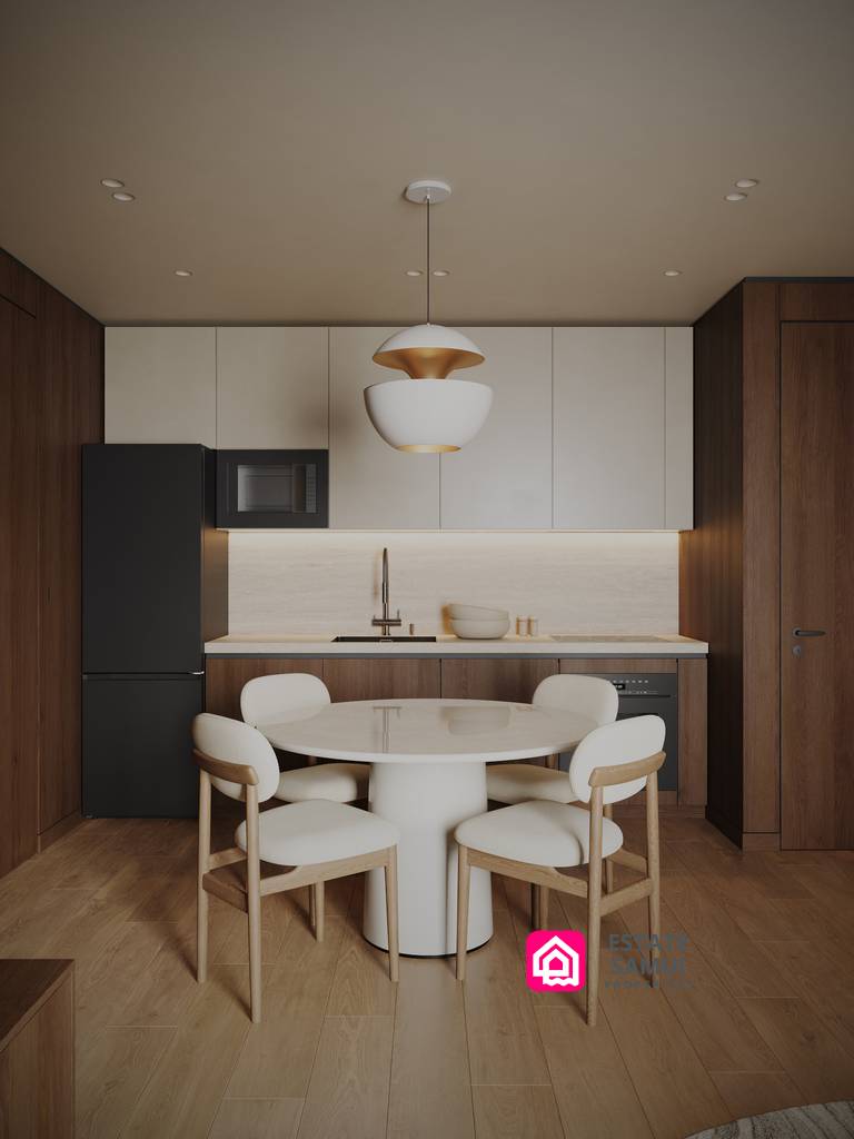 Dining table and kitchen area with wood cabinetry