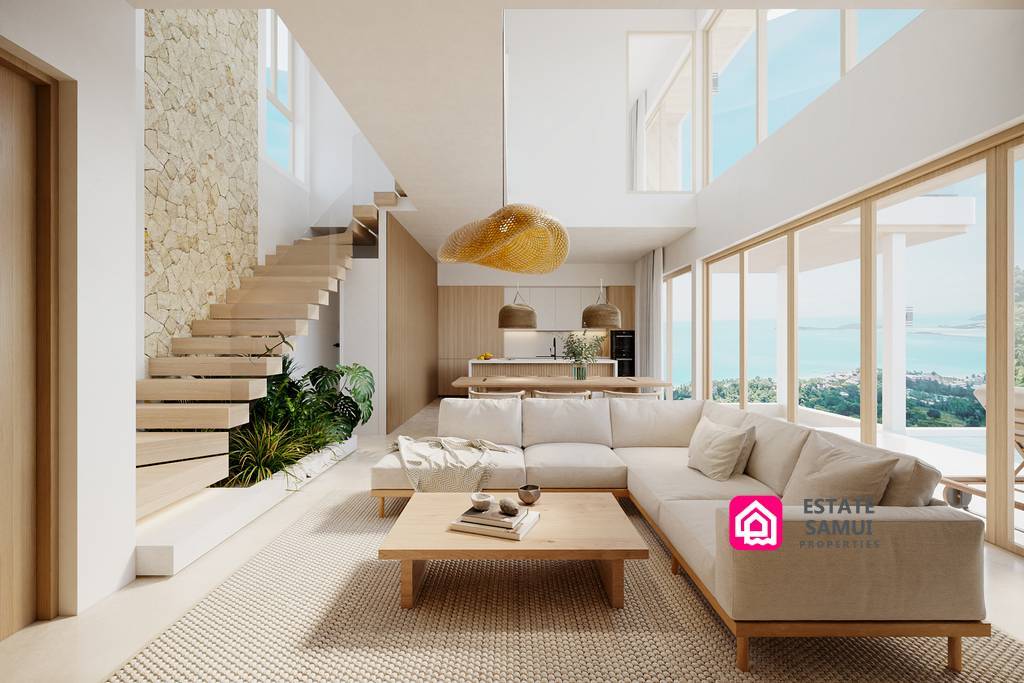 Contemporary living area with floor-to-ceiling windows and sea views