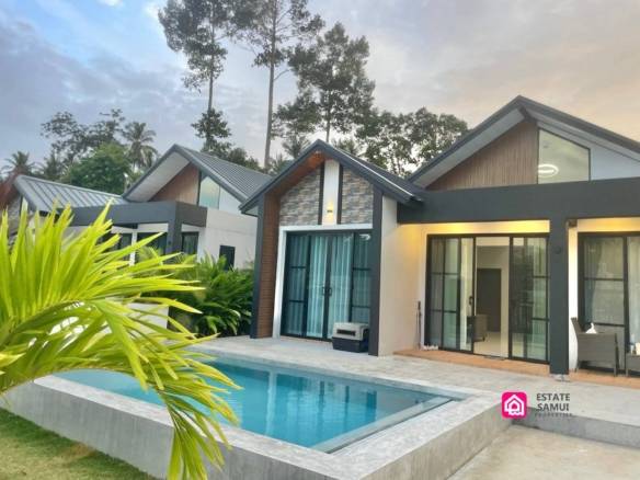 Contemporary pool villa in Maenam with gabled roofs and poolside terrace.
