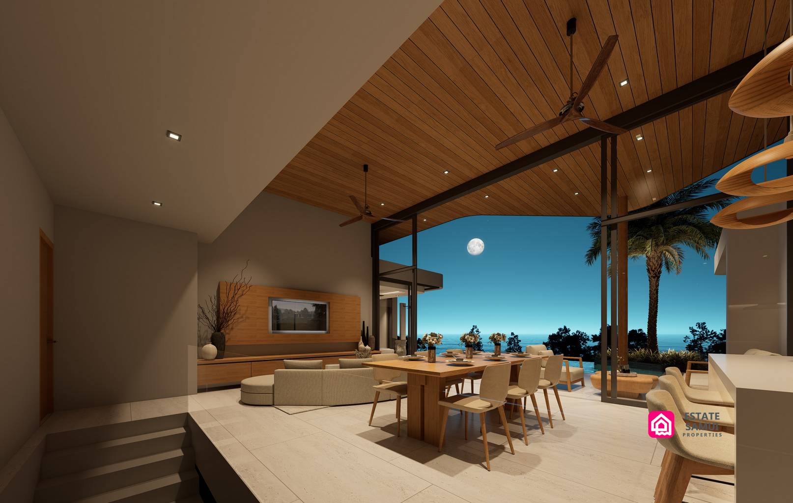 Evening living and dining area opening towards the poolside terrace.