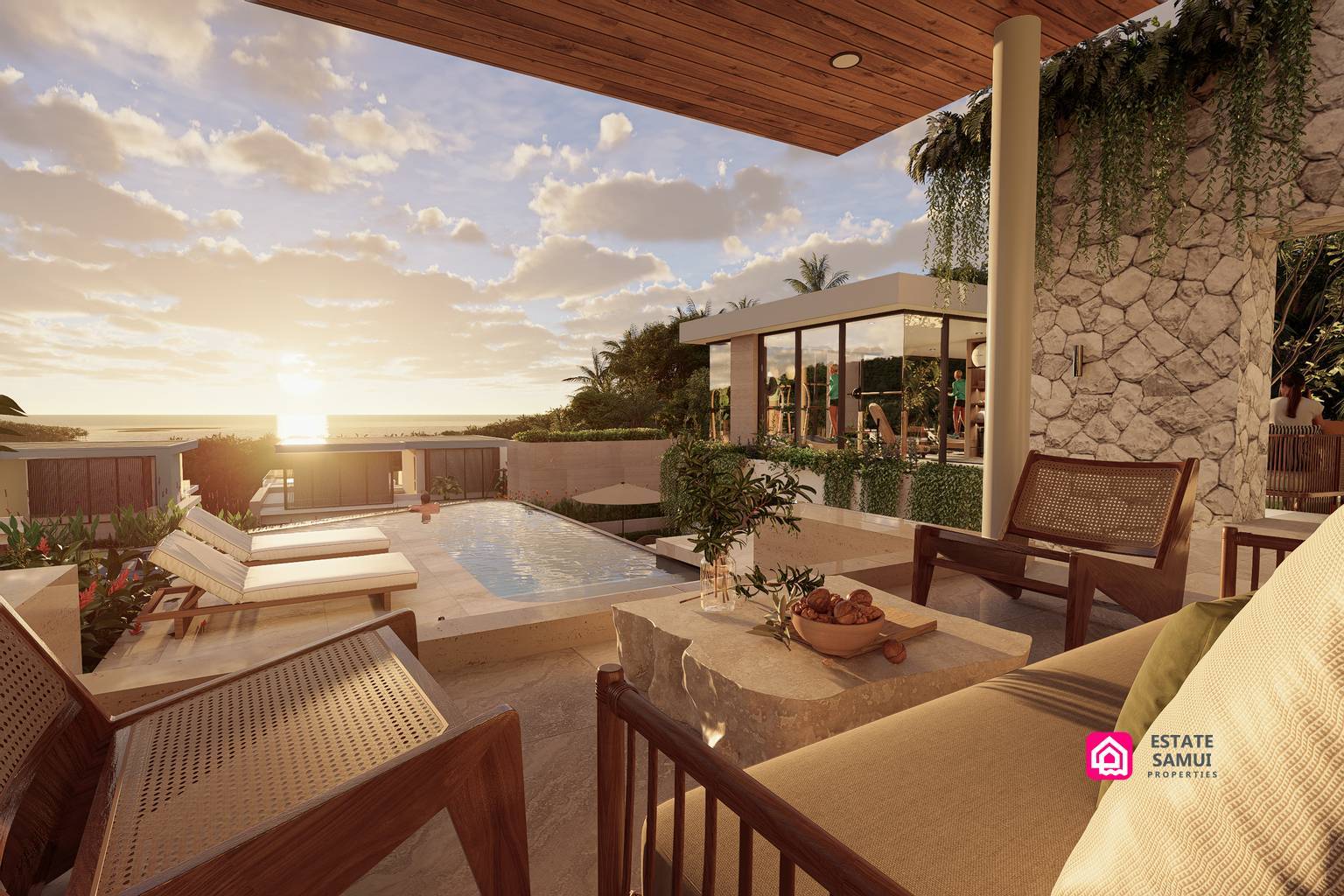 1. Sheltered poolside seating overlooking the sea at sunset.