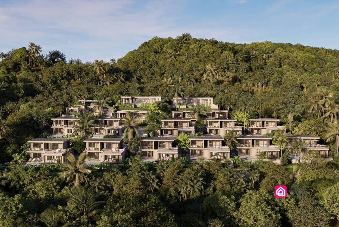Modern villas arranged across a densely planted hillside.