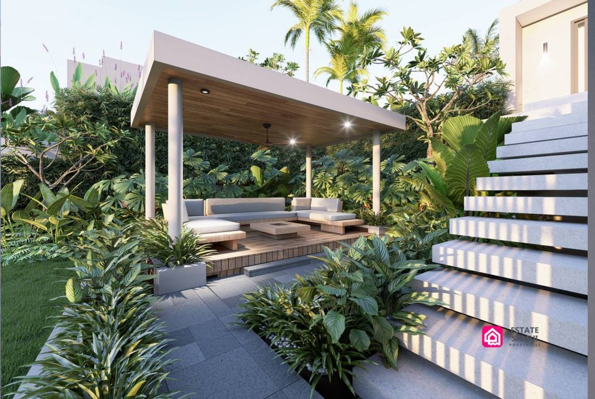 Sheltered garden sala beside an illuminated outdoor staircase.