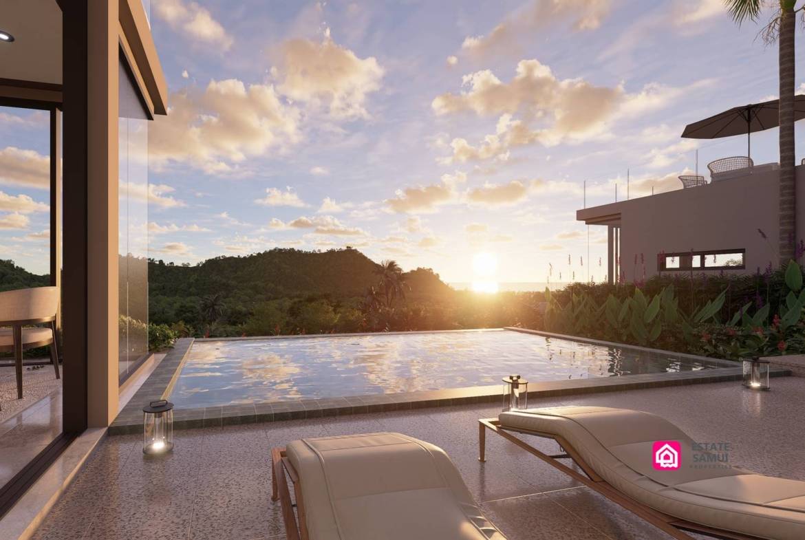 Poolside loungers overlooking wooded hills at sunset.