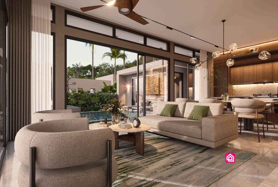 Contemporary lounge with garden-facing glazing and adjoining kitchen.