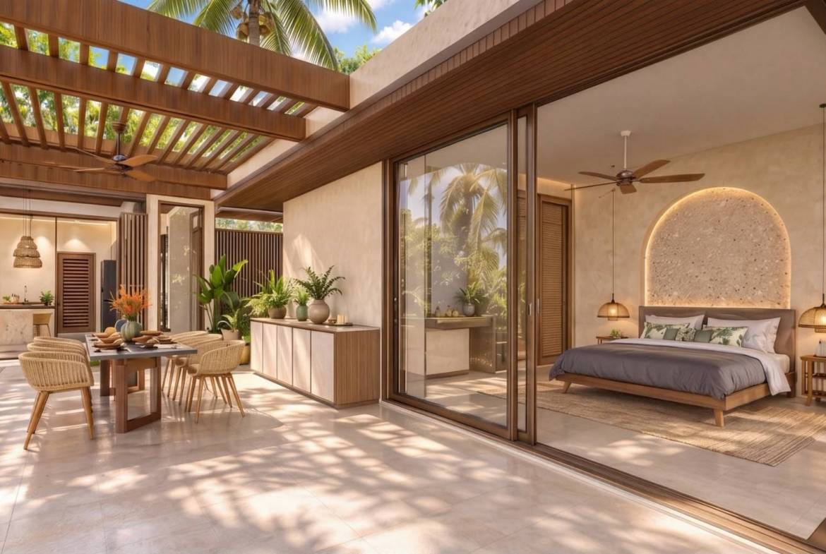 Bedroom opening onto a covered terrace beside an outdoor dining area
