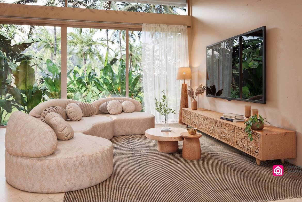 Curved living room sofa facing television beside garden-facing glazing