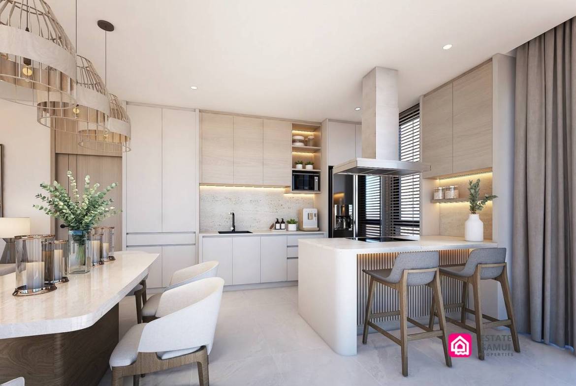 Built-in kitchen with breakfast bar, stools and adjacent dining table