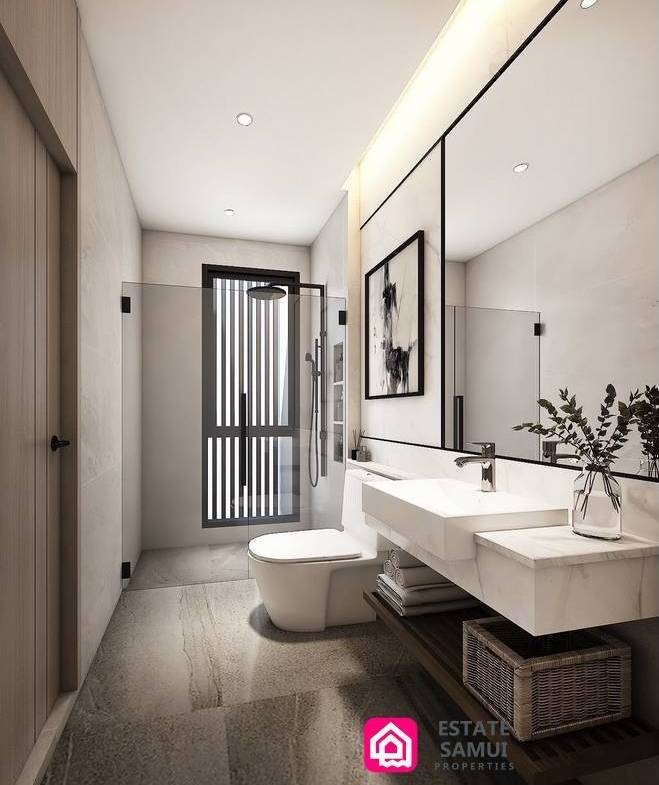Bathroom with floating vanity, wide mirror and glass shower enclosure