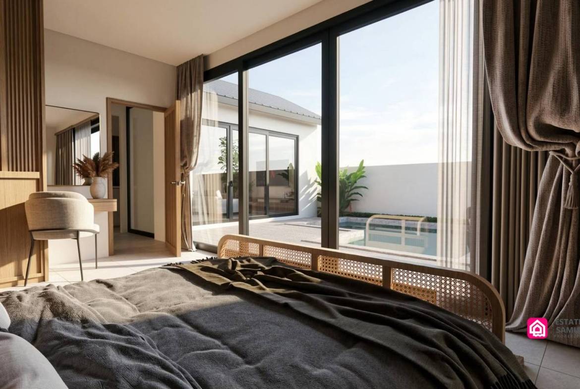 Pool-facing bedroom with sliding glass doors and a built-in dressing area.