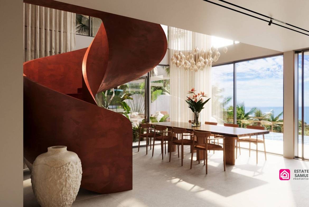 Sculptural red staircase beside dining area overlooking the pool and sea.