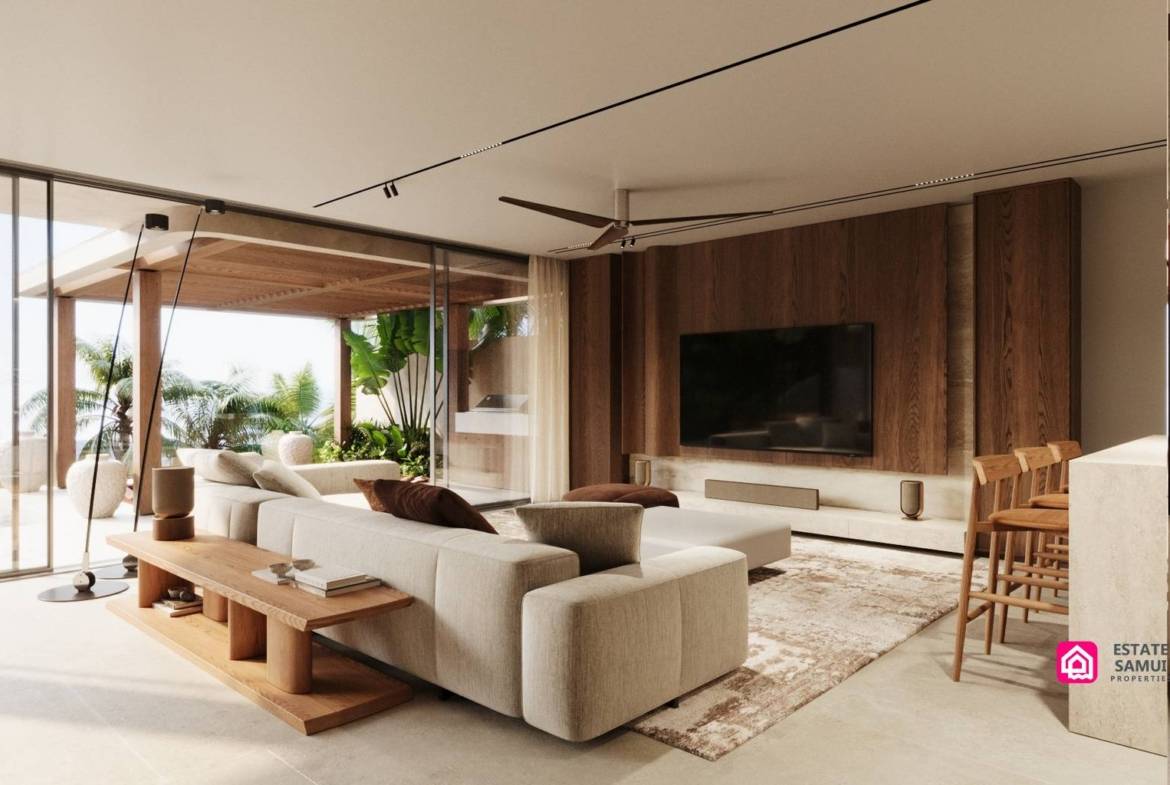 Open-plan lounge with cream sofa, timber television wall and terrace access.